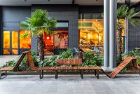 Tailored VT seating system with Spotted Gum hardwood battens, Textura Dark Bronze frame.