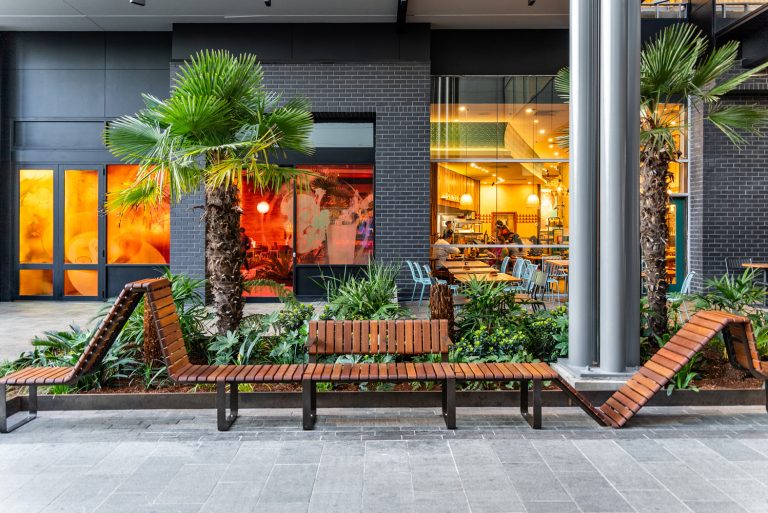 Tailored VT seating system with Spotted Gum hardwood battens, Textura Dark Bronze frame.