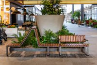 Tailored Linea VT seating system with Spotted Gum hardwood battens, Textura Dark Bronze frame.