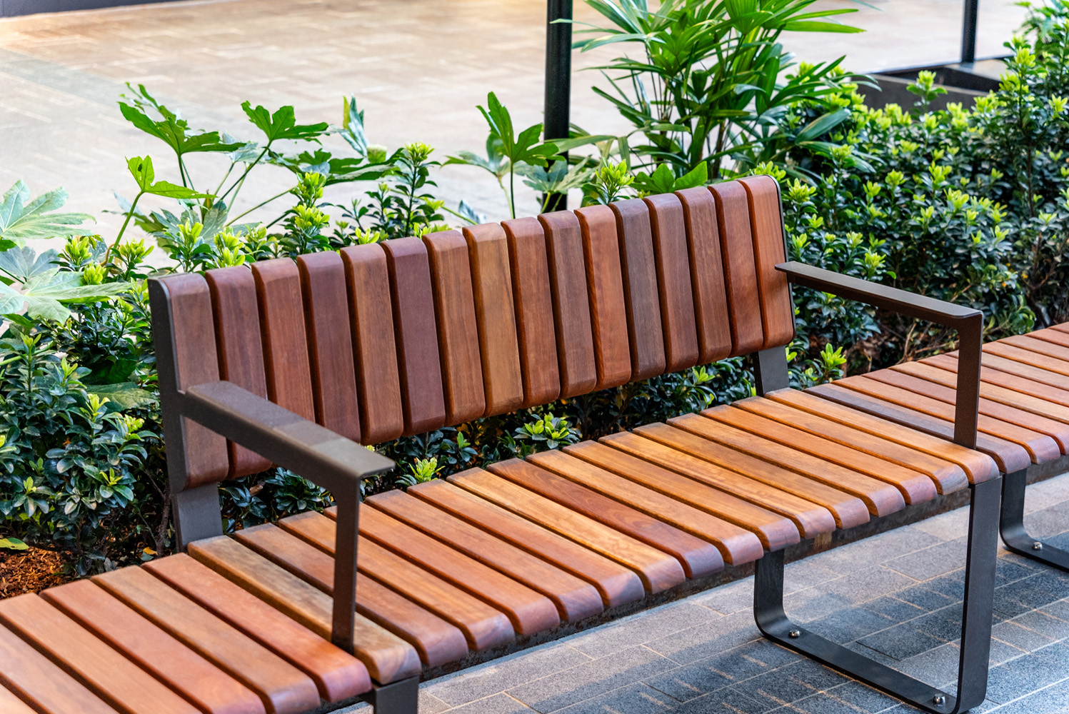 Tailored Linea VT seat with Spotted Gum hardwood battens, Textura Dark Bronze frame.