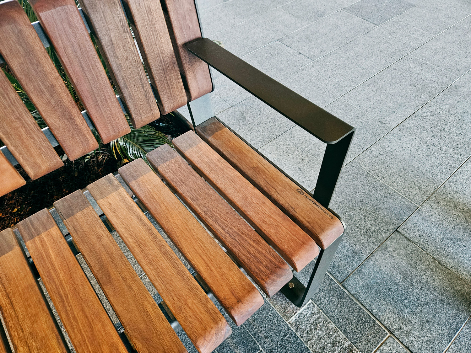 Tailored Linea VT seat with Spotted Gum hardwood battens, Textura Dark Bronze frame.