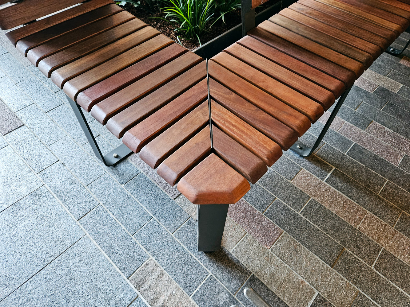 Tailored Linea VT bench with Spotted Gum hardwood battens, Textura Dark Bronze frame.