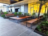 Tailored Linea Platform with Hill, Spotted Gum hardwood battens, Textura Dark Bronze frame.