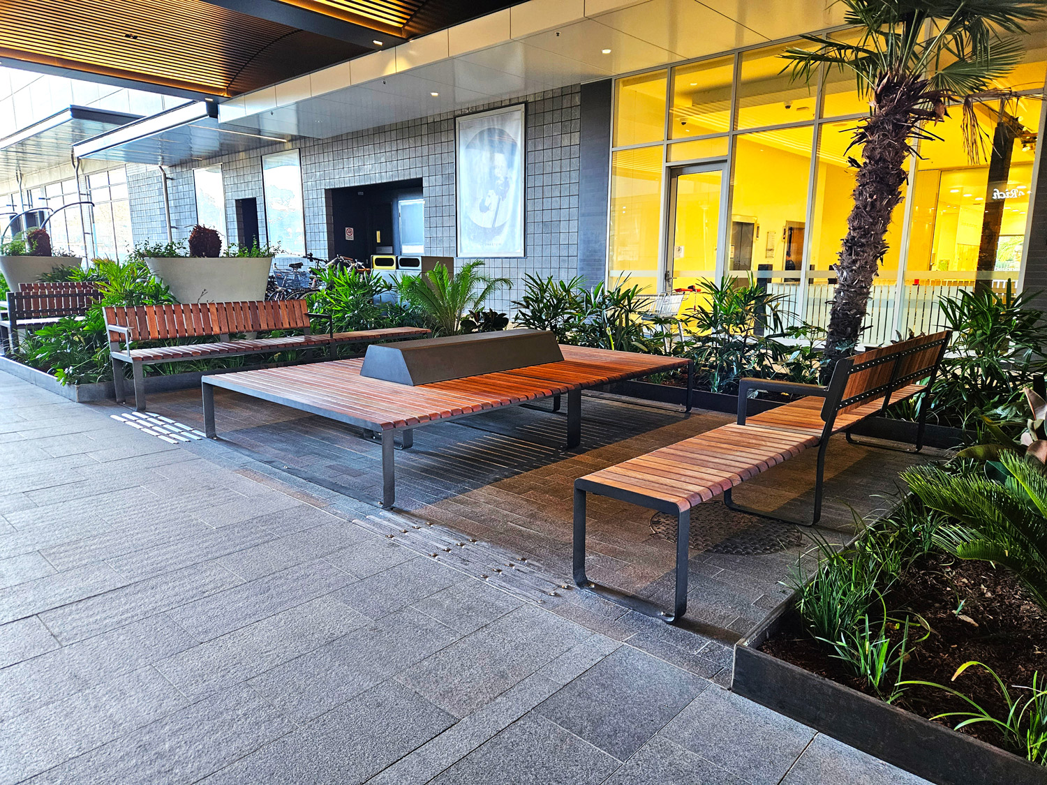 Tailored Linea Platform with Hill, Spotted Gum hardwood battens, Textura Dark Bronze frame.