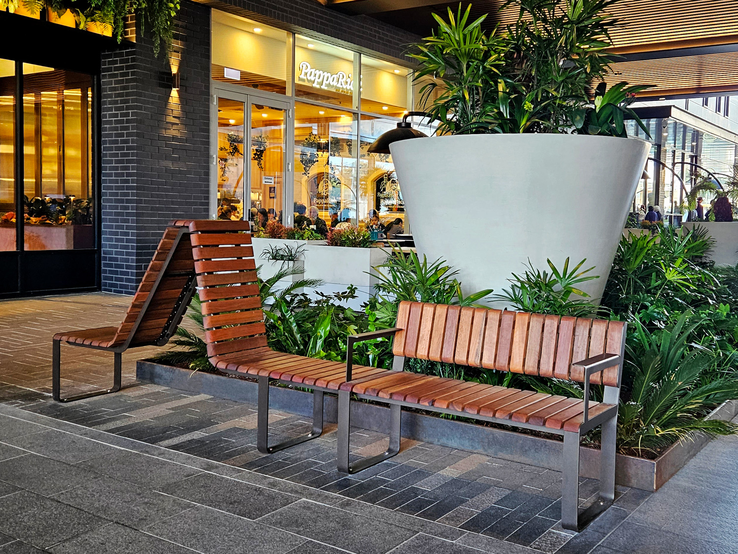 Tailored Linea VT seating system with Spotted Gum hardwood battens, Textura Dark Bronze frame.
