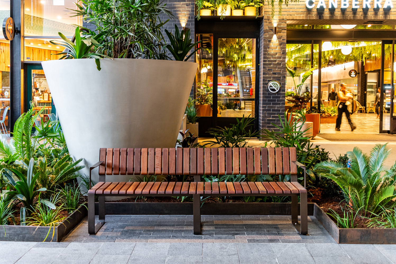 Tailored Linea VT seat with Spotted Gum hardwood battens, Textura Dark Bronze frame.
