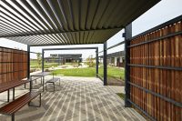Linea Table (LIT10, 1800) and Bench (1500) with aluminium Bush Cherry battens, Textura Monument frame.
