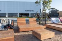Custom double and single sun loungers, and side tables, for URBNSURF Melbourne.