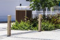 Linea Bollard (B6) with etched artwork, aluminium Bush Cherry insert, Textura Doe Skin frame.