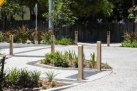 Linea Bollard (B6) with etched artwork, aluminium Bush Cherry insert, Textura Doe Skin frame.