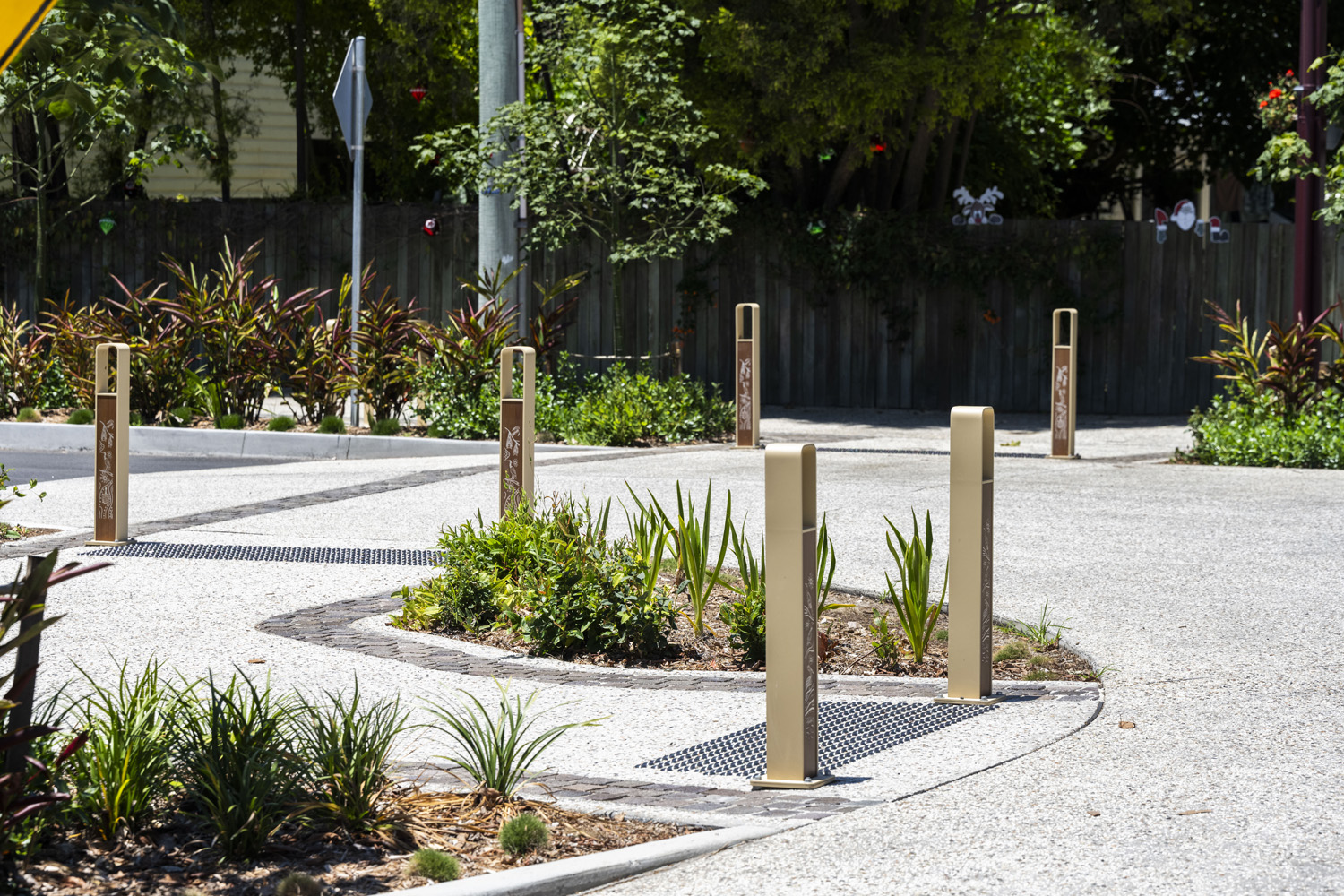 Linea Bollard (B6) with etched artwork, aluminium Bush Cherry insert, Textura Doe Skin frame.