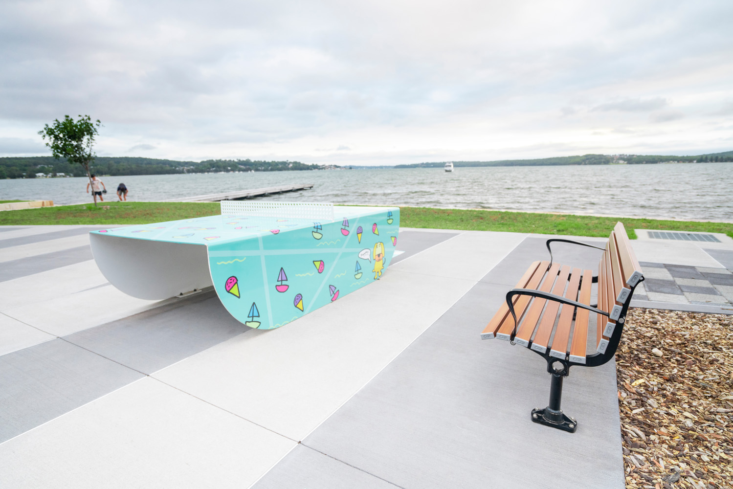 Mall Seat with battens in woodgrain aluminium Bush Cherry, angle arms and frame in Night Sky.