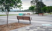 Mall Seat with battens in woodgrain aluminium Bush Cherry, angle arms and frame in Night Sky.