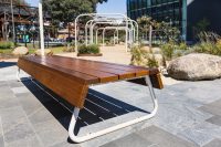 Custom bench, designed by SBLA, with hardwood battens and custom Shoji White frame.