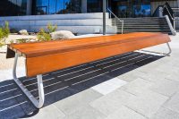 Custom bench, designed by SBLA, with hardwood battens and custom Shoji White frame.