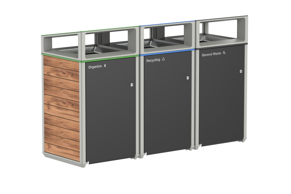 Three-section outdoor waste station with a wooden left panel and bins labeled Organics, Recycling, and General Waste on gray doors.