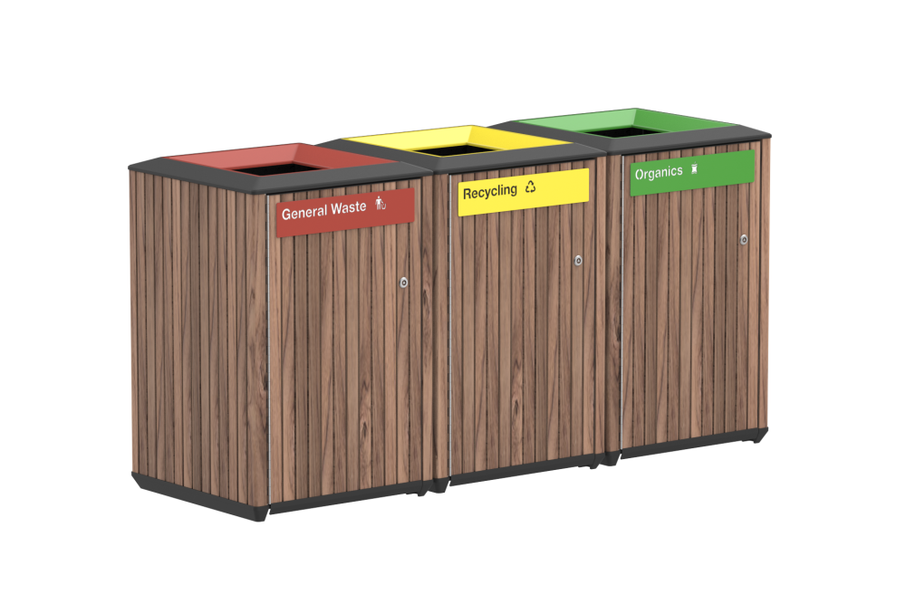 Triple wooden waste bins labeled General Waste (red), Recycling (yellow), and Organics (green) for waste separation.