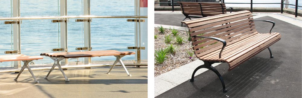 Splay Leg_Arch Leg_Street Furniture Australia - Street Furniture Australia Two wooden benches with metal legs on a sunny waterfront promenade.